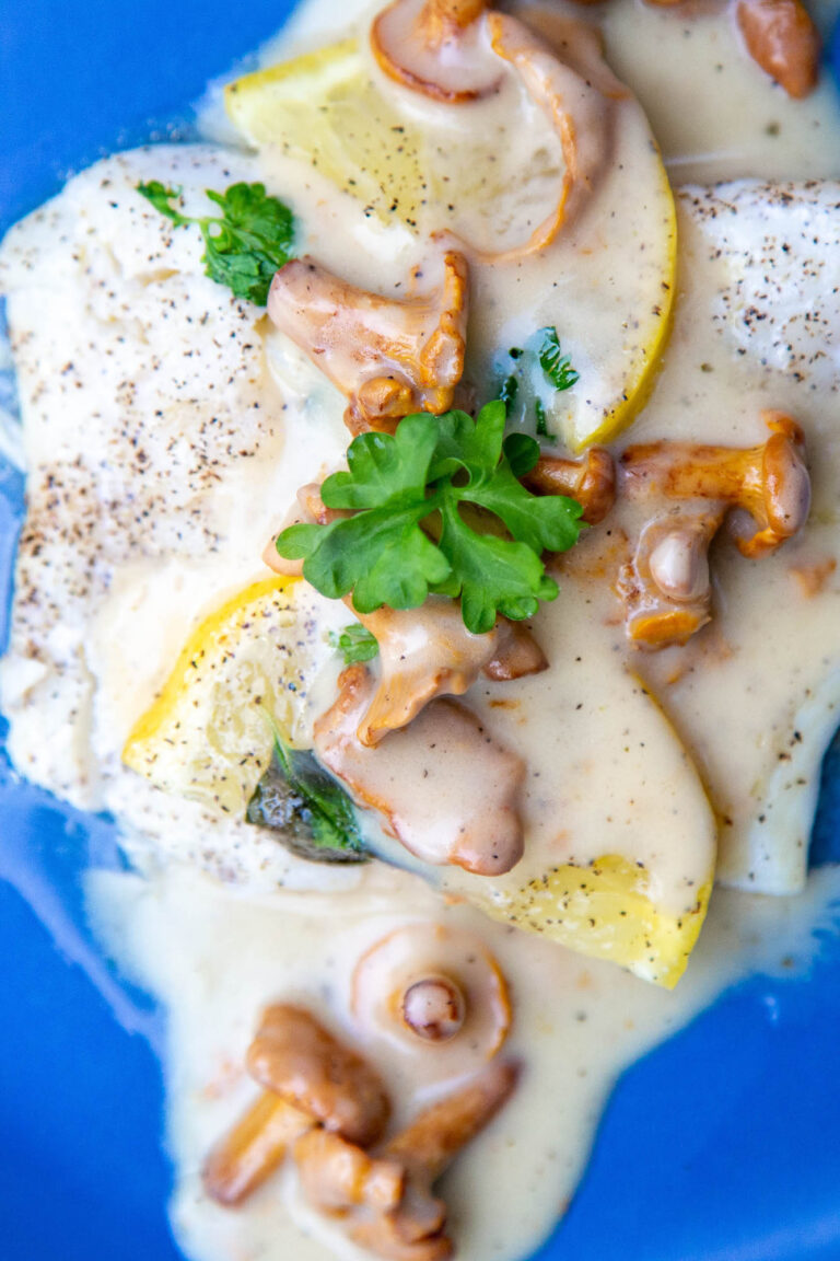 Grilled Cod in Foil Served with a Creamy Chanterelle Wine Sauce grilled cod with chanterelle sauce